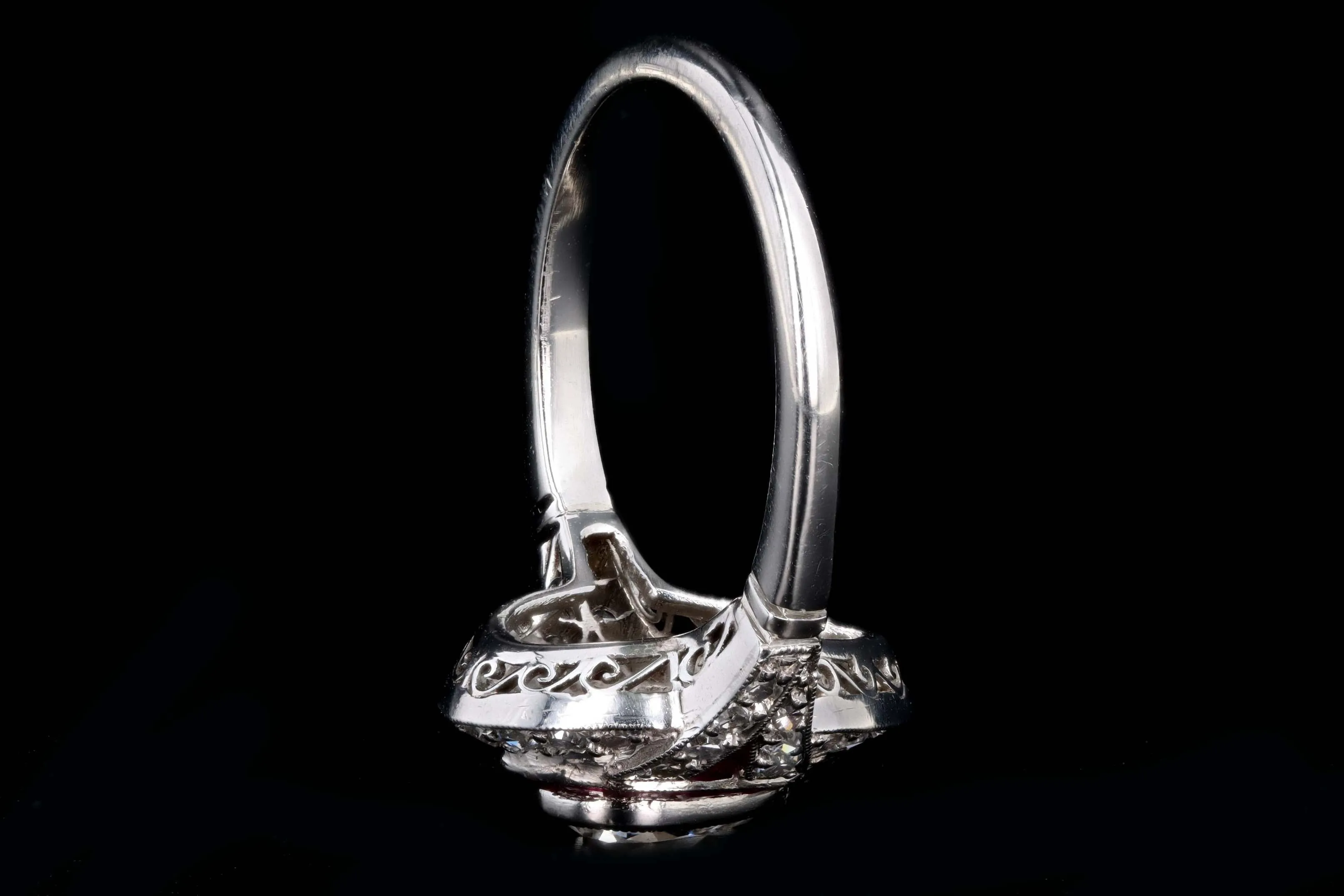 Art Deco Inspired .76 Carat Pear Cut Diamond & Natural Ruby Halo Engagement Ring