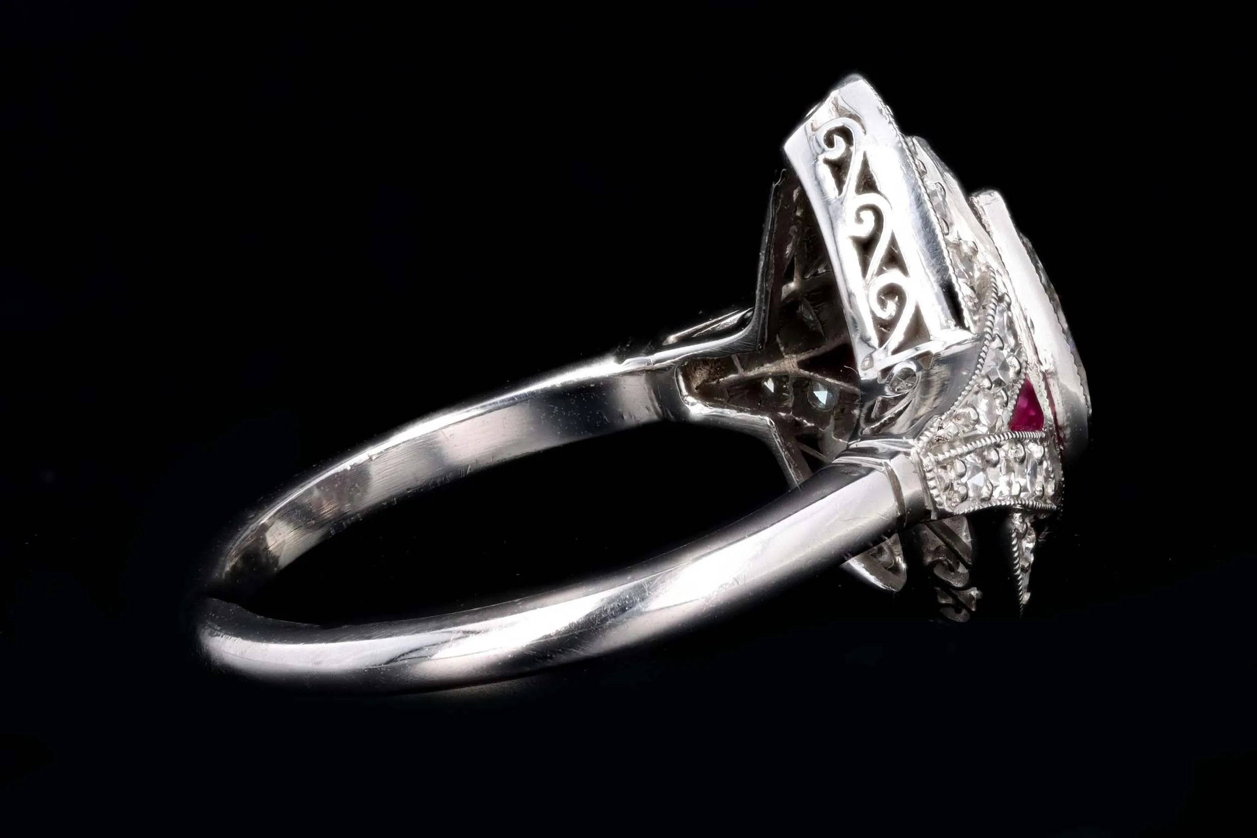 Art Deco Inspired .76 Carat Pear Cut Diamond & Natural Ruby Halo Engagement Ring