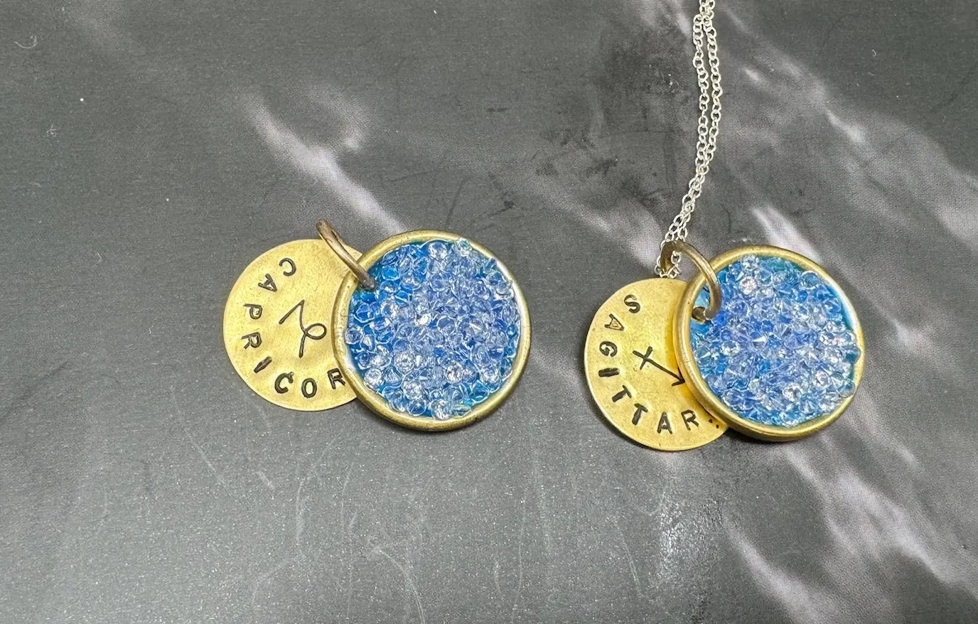 Aurora December birthstone and zodiac pendant, Sagittarius or Capricorn