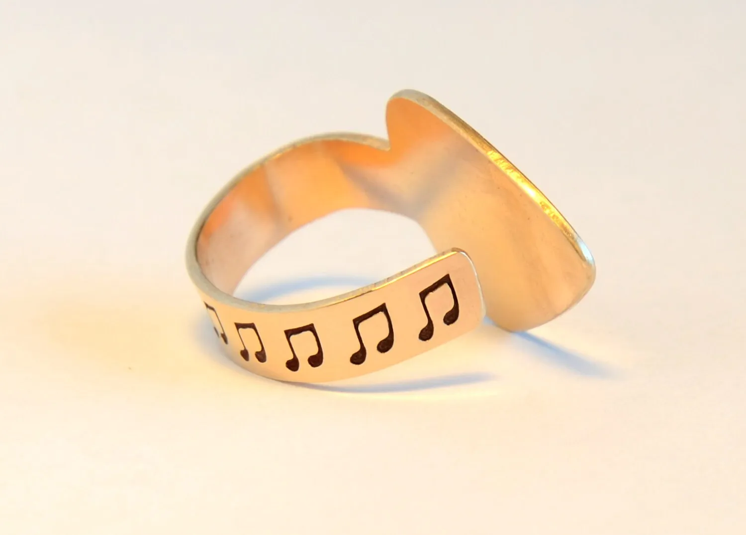 Bronze thumb guitar pick with I pick you