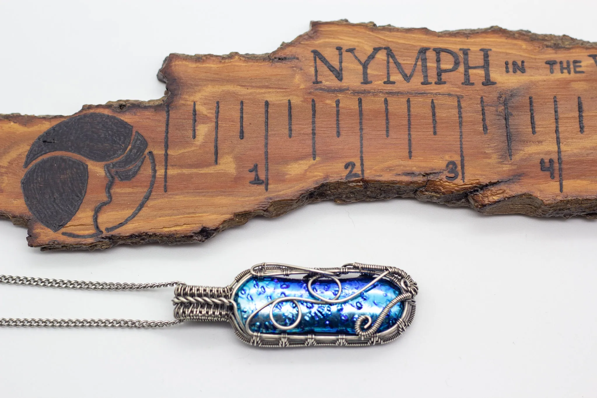 Dichroic Blue Fused Glass Pendant with Sterling Silver Wire Wrapping
