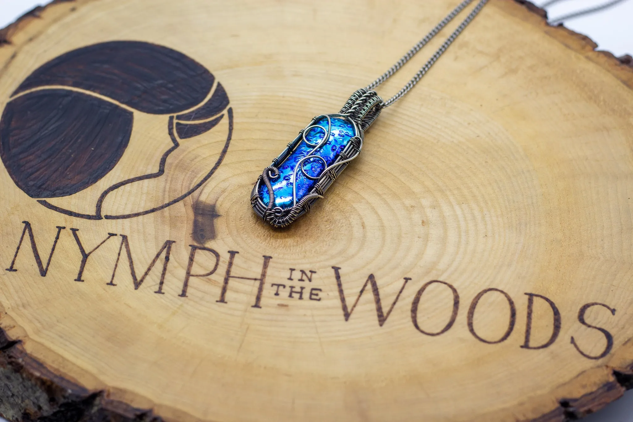Dichroic Blue Fused Glass Pendant with Sterling Silver Wire Wrapping