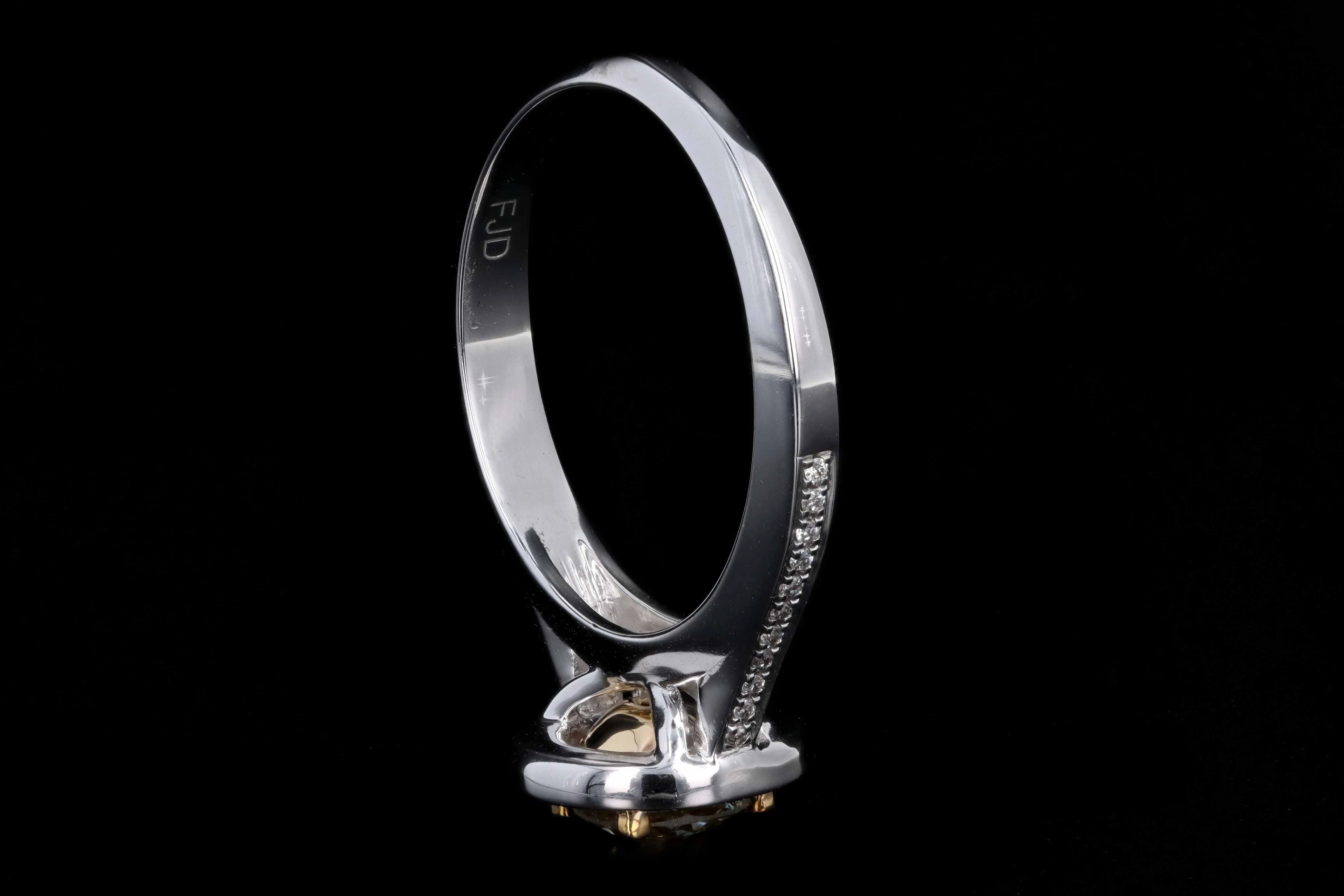 New 14K White Gold .65 Carat Fancy Light Yellow Diamond Halo Ring