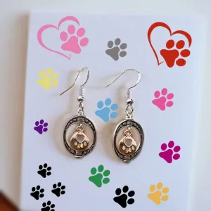 Oval Frame with Gold Toned Paw Print Charm Earrings