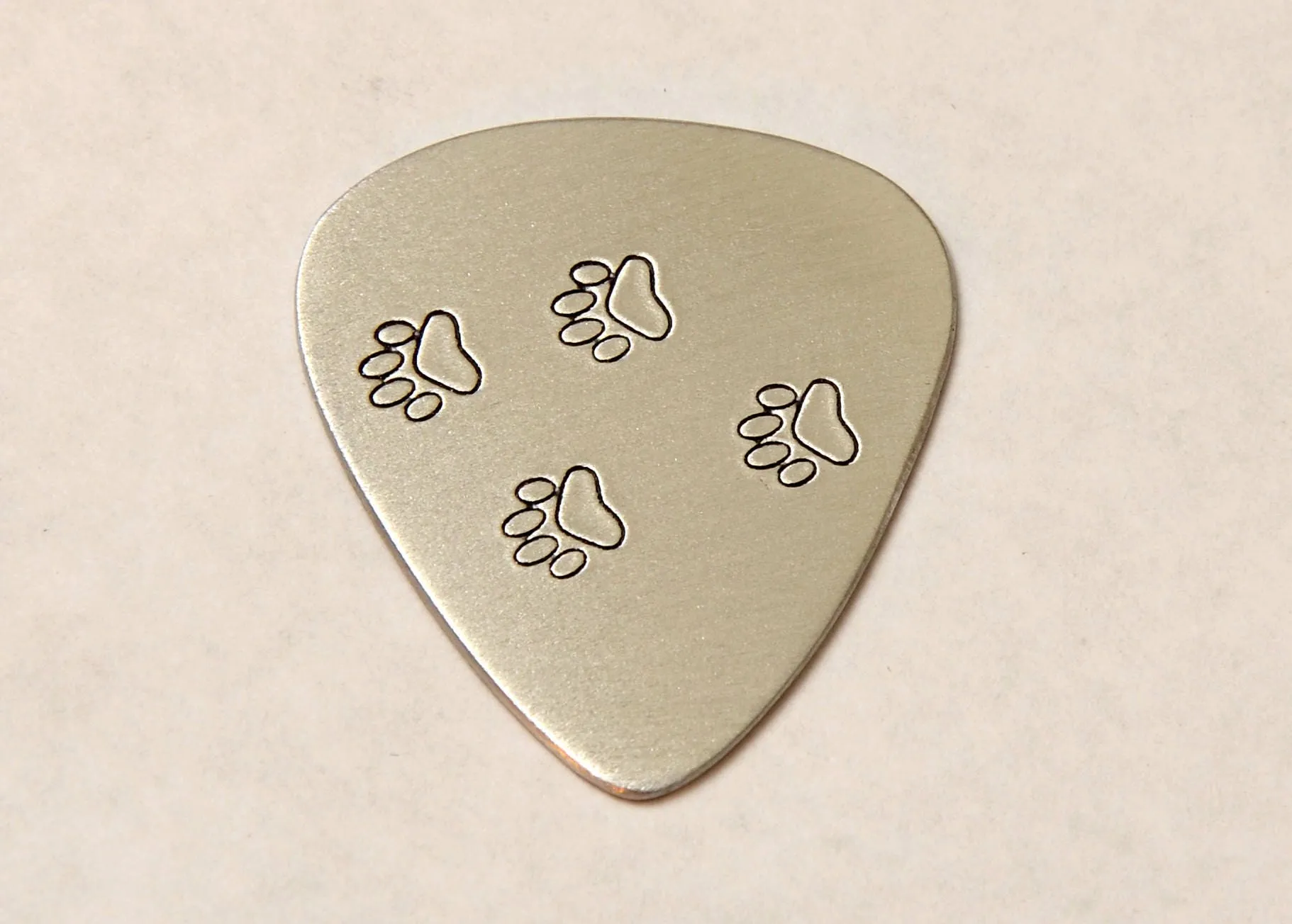 Paw Aluminum Guitar Pick to Awaken your Wild Side