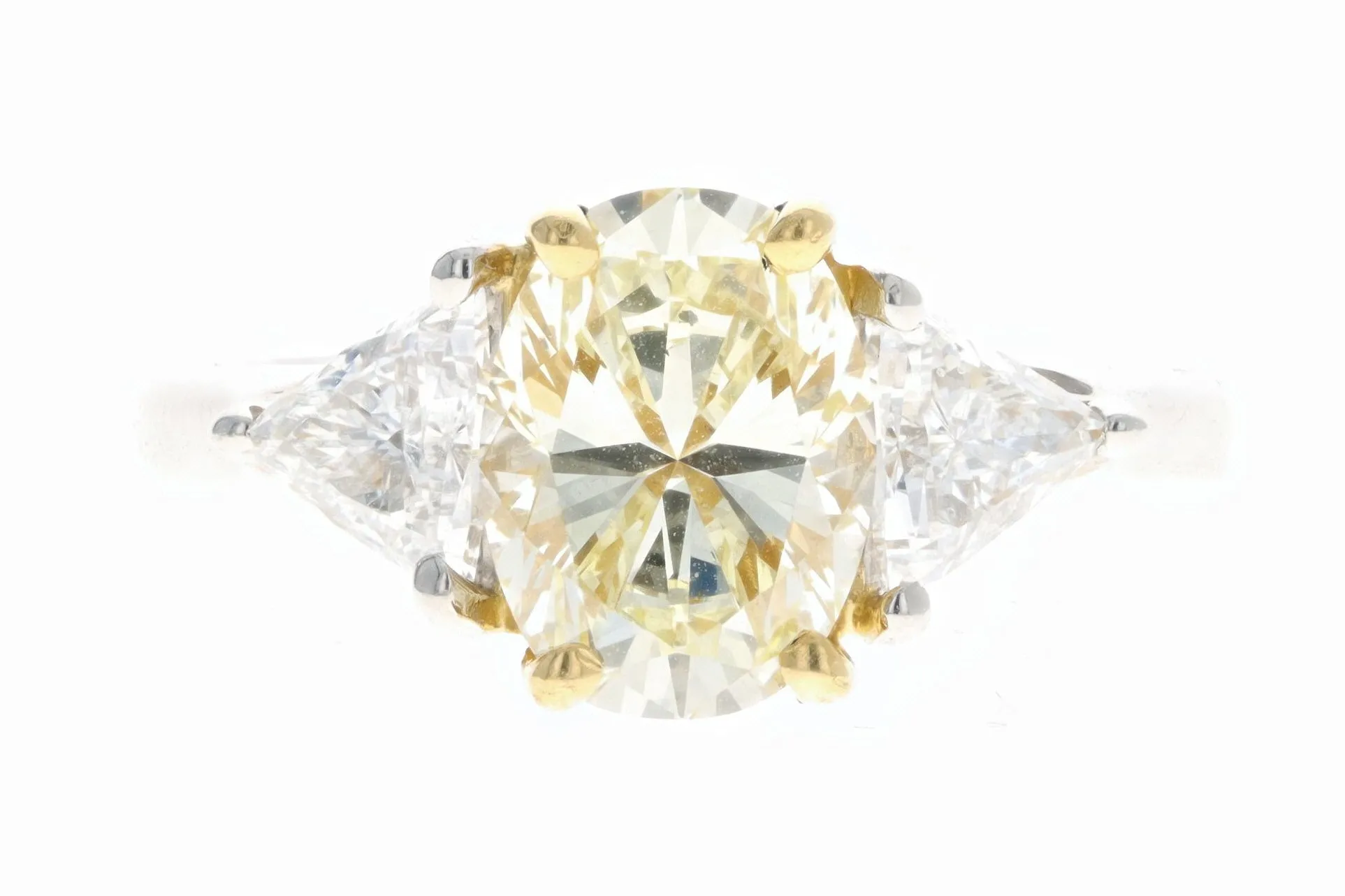 Platinum and 22K Yellow Gold 1.76 Carat Oval Cut Fancy Yellow Diamond Engagement Ring