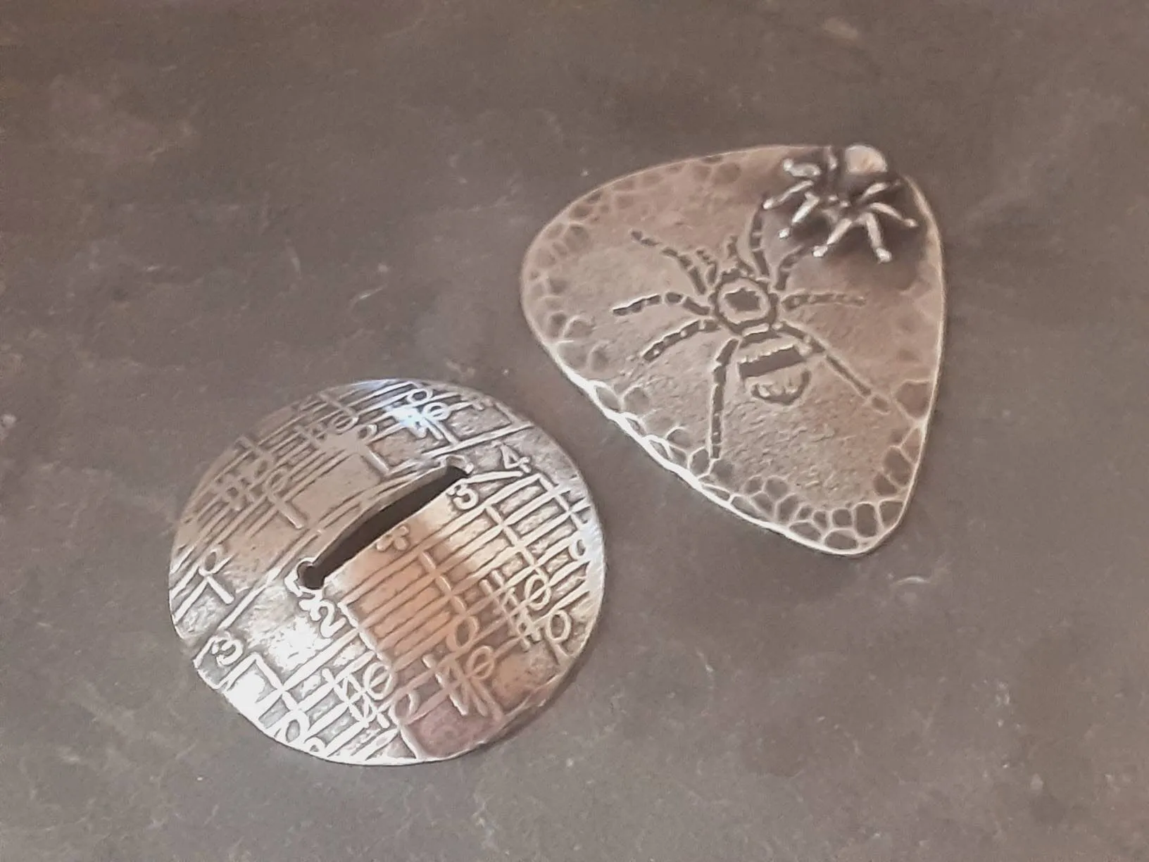 Spider themed sterling silver guitar pick with 3D spider and guitar pick holder stand