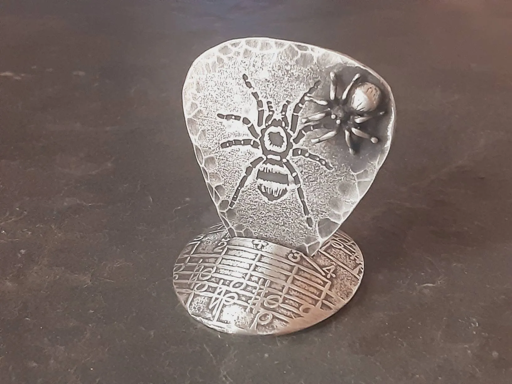 Spider themed sterling silver guitar pick with 3D spider and guitar pick holder stand