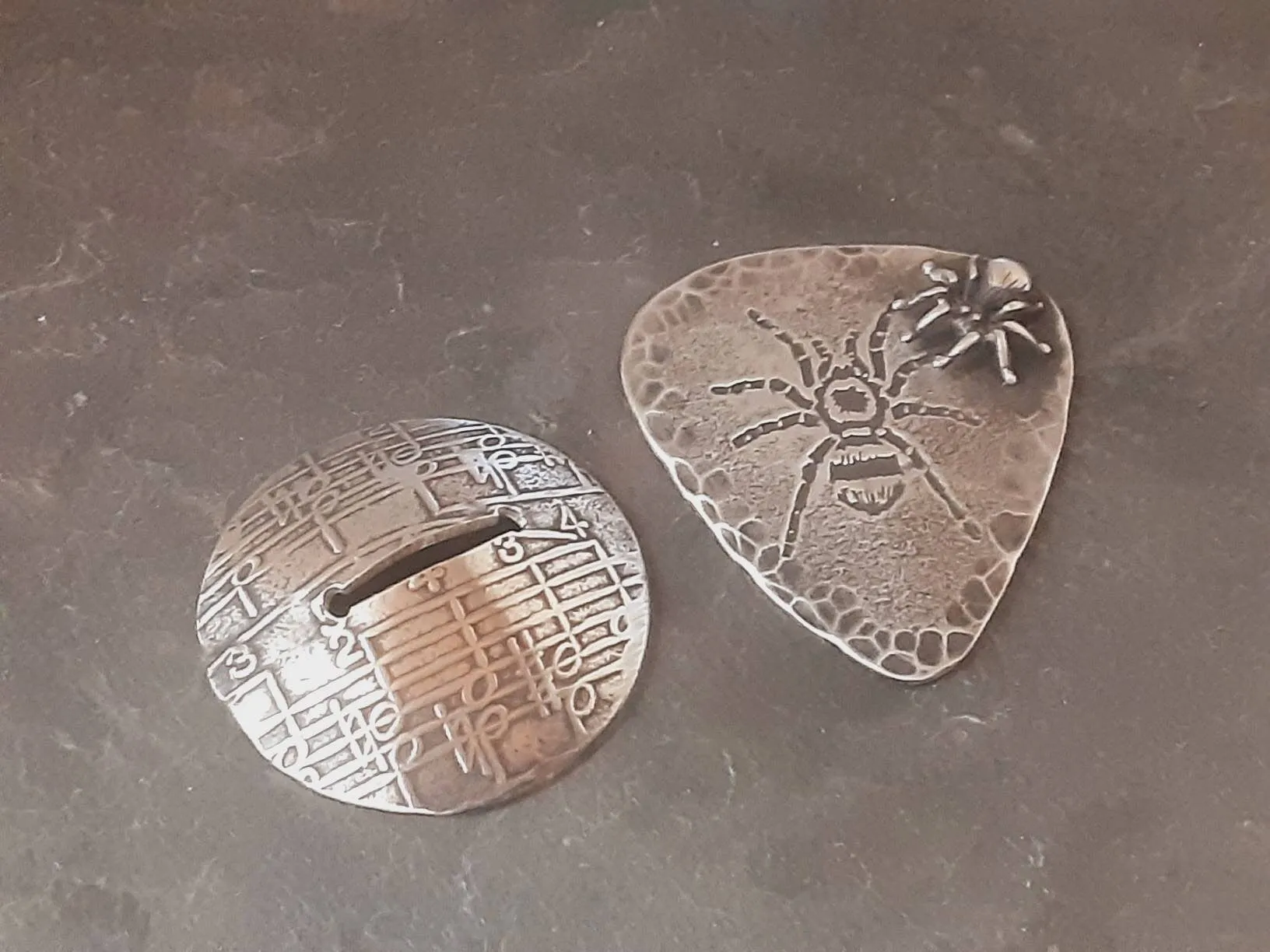 Spider themed sterling silver guitar pick with 3D spider and guitar pick holder stand