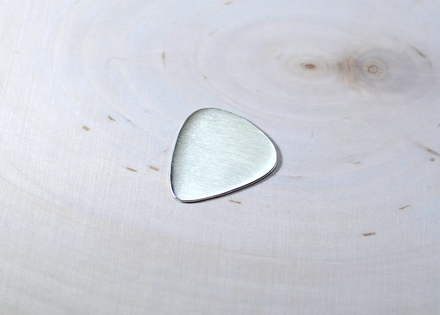 Sterling silver guitar pick ready to personalize
