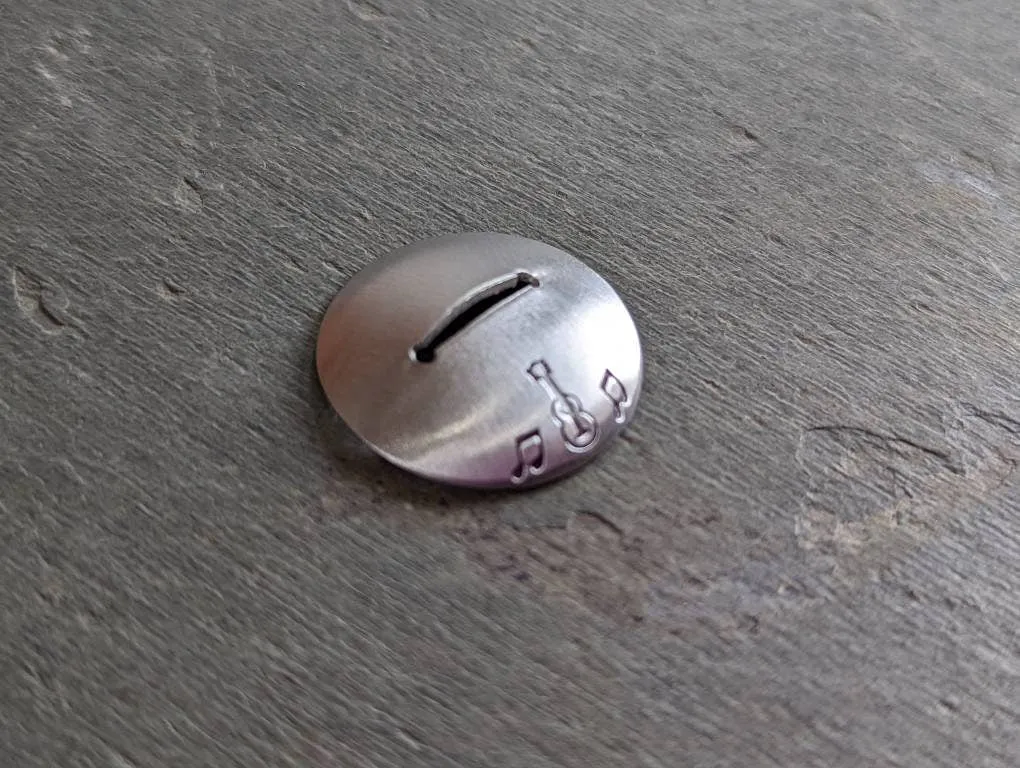 Sterling silver guitar pick stand with music notes and guitar theme