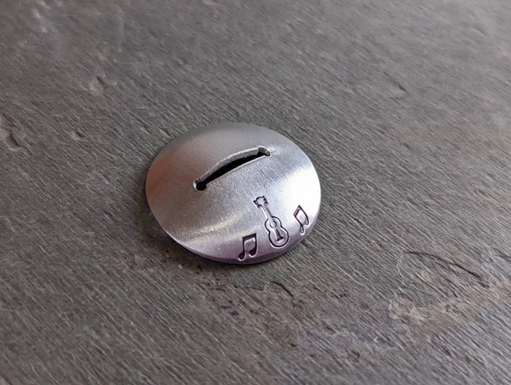 Sterling silver guitar pick stand with music notes and guitar theme