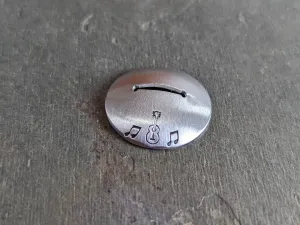 Sterling silver guitar pick stand with music notes and guitar theme