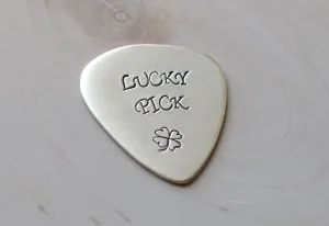 Sterling silver lucky guitar pick with four leaf clover