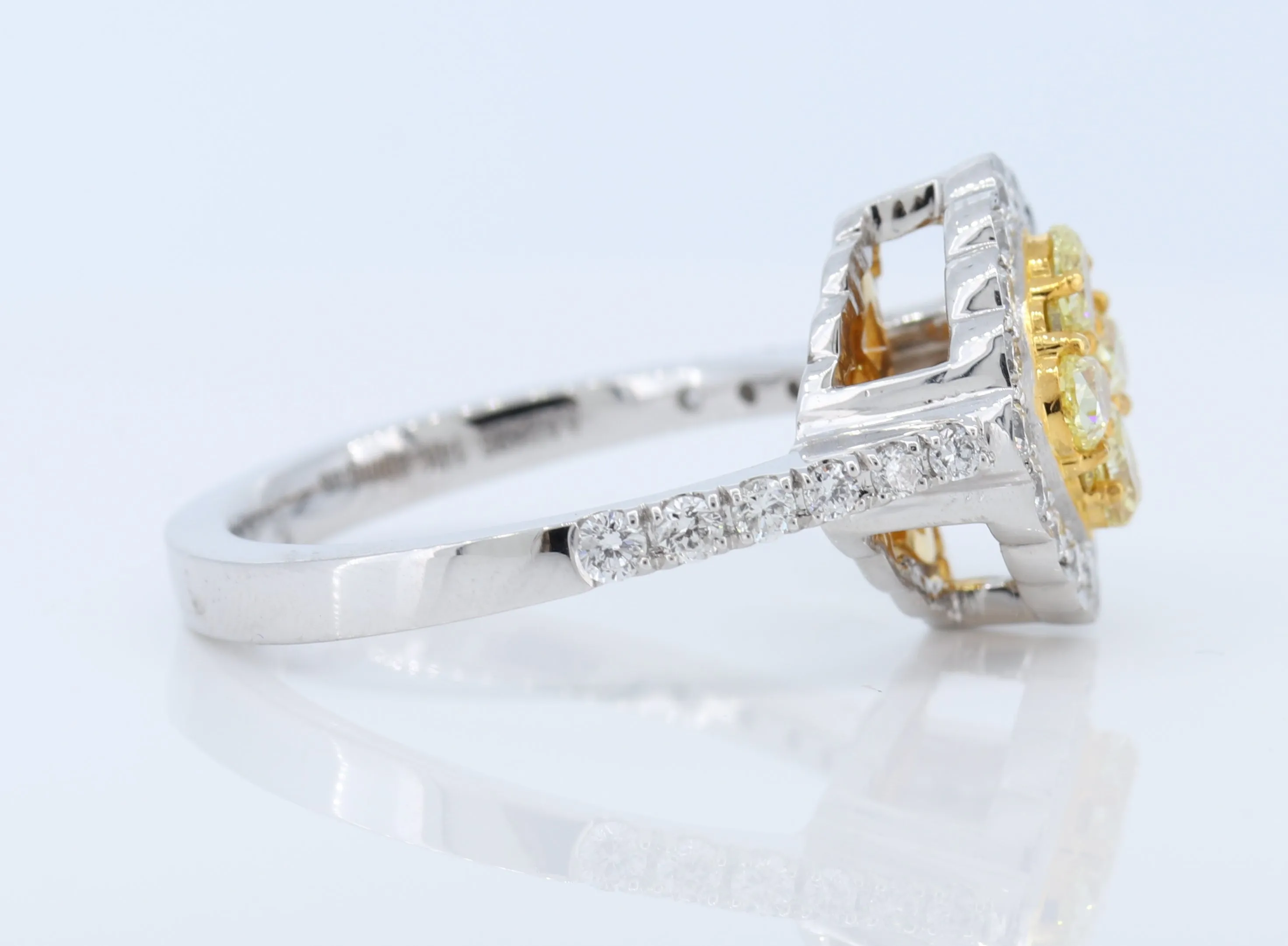 Stunning Yellow Diamond Ring set in 18K White Gold.