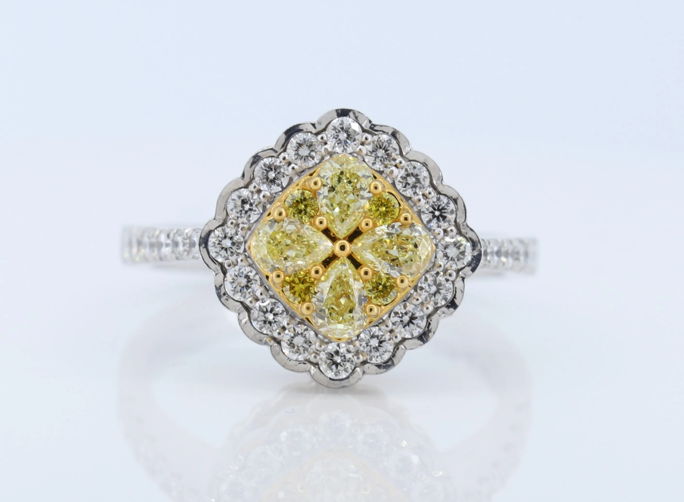 Stunning Yellow Diamond Ring set in 18K White Gold.