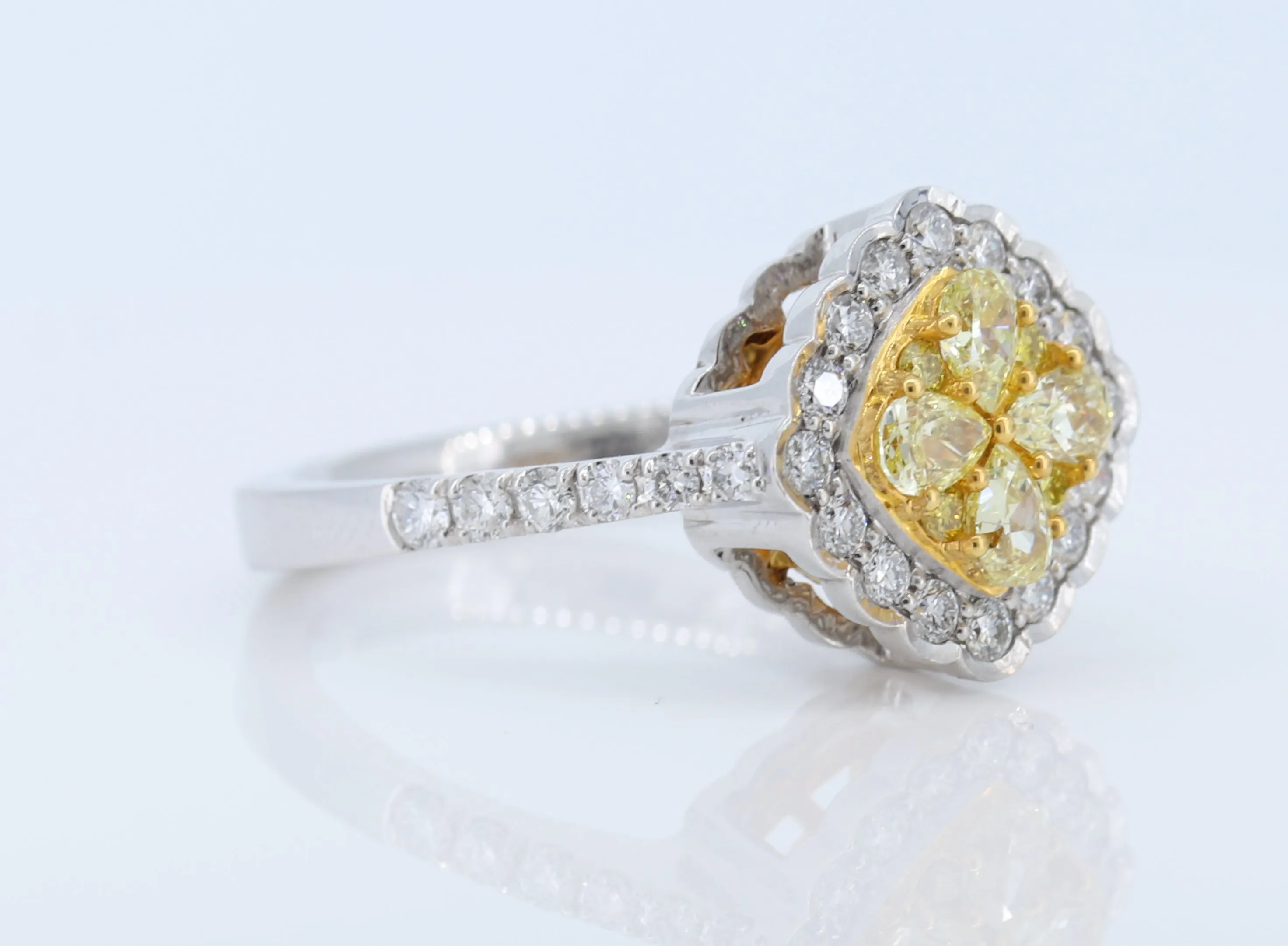 Stunning Yellow Diamond Ring set in 18K White Gold.