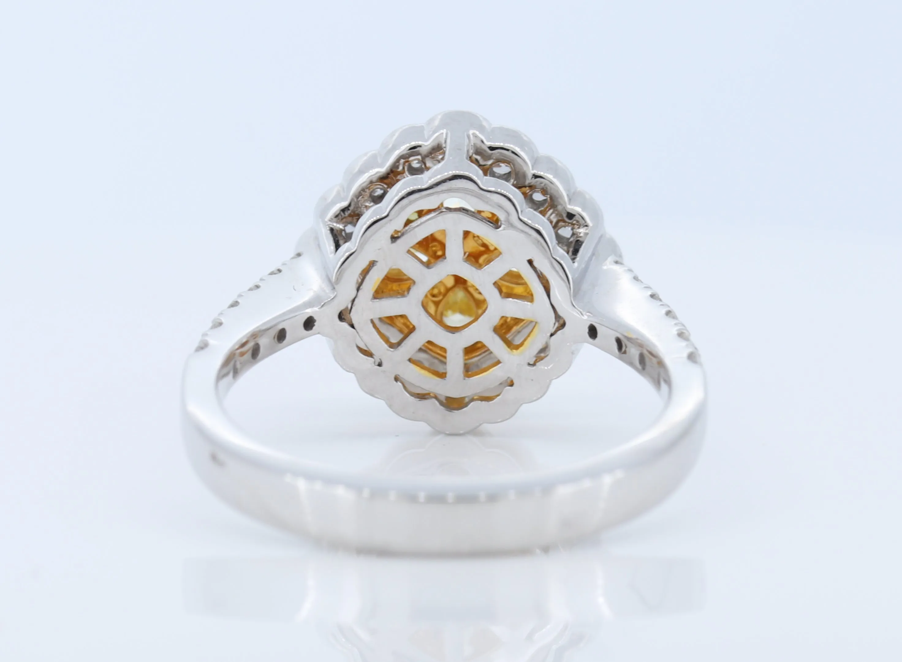 Stunning Yellow Diamond Ring set in 18K White Gold.