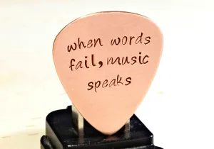 When Words Fail Music Speaks copper guitar pick
