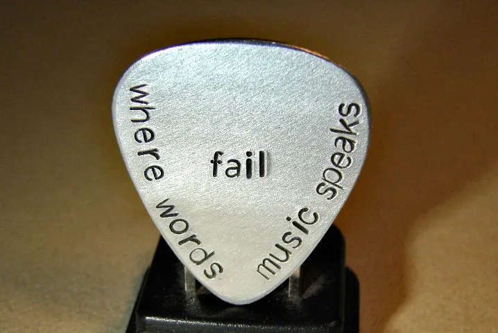 Where words fail music speaks aluminum guitar pick