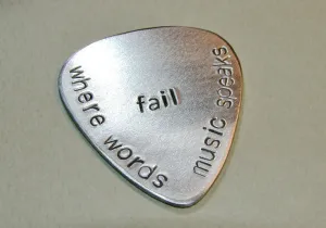 Where words fail music speaks aluminum guitar pick